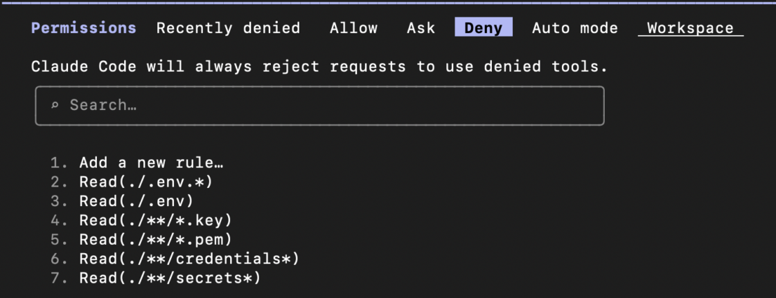 Claude Code /permissions screen showing the Deny list containing the .env and key file read rules